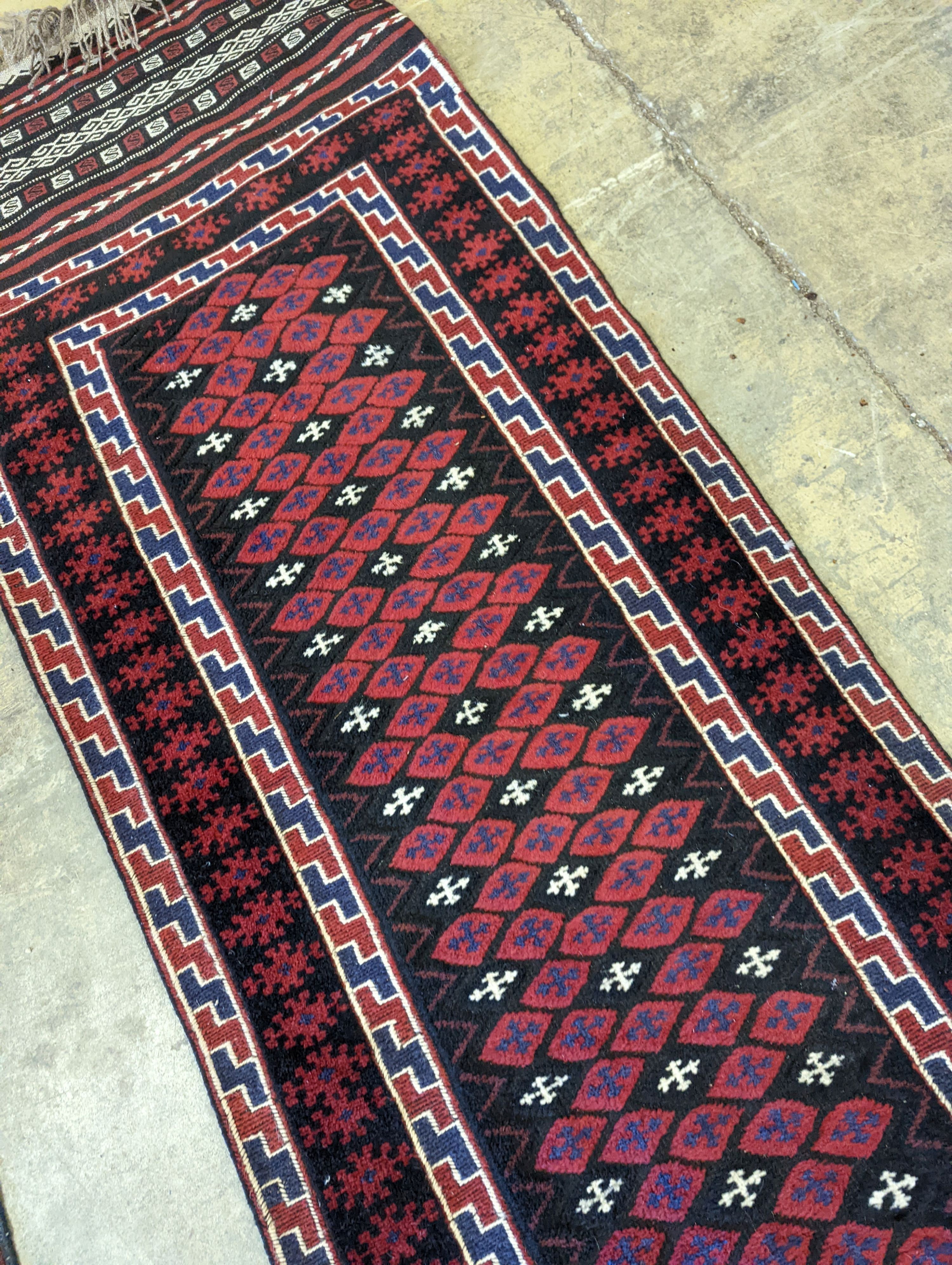 A Kilim flat weave runner, 290 x 62cm